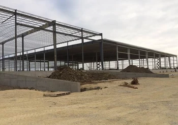 Butler Steel framing The Butler Steel frame of a warehouse bare of walls or windows.